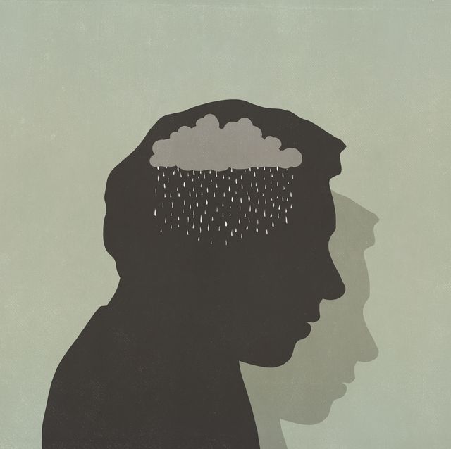silhouette of sad man with rain cloud in head