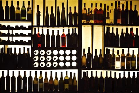 silhouette wine bottles on shelf