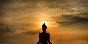 yoga silhouette woman sitting area meditating