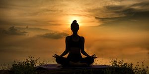 yoga silhouette woman sitting area meditating
