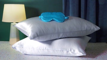 silk pillowcases stacked with eyemask on top