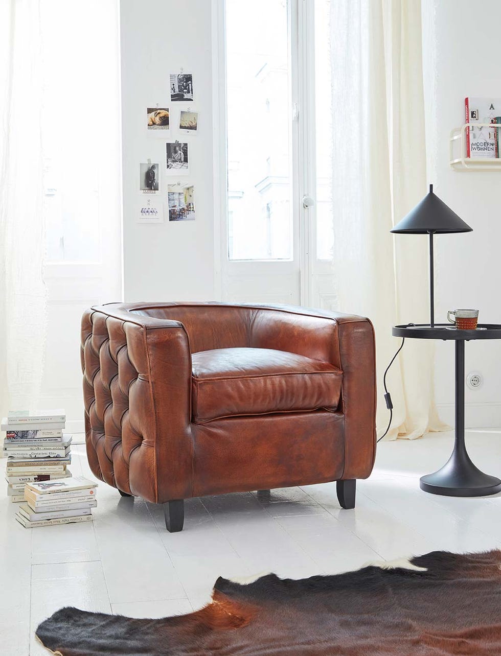 Sillón de piel capitoné