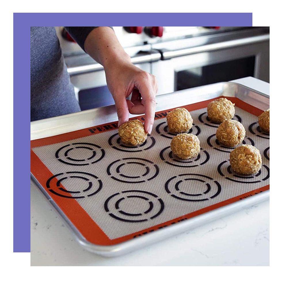 woman putting cookie dough on silpat baking mat