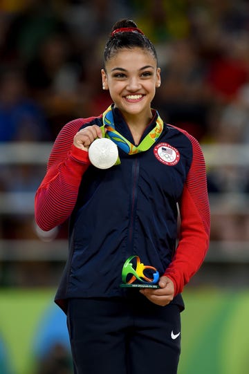 laurie hernandez poses with a silver medal during the 2016 olympics in rio