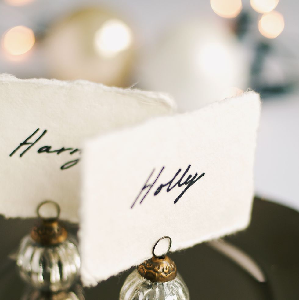 silver place name card holder and card