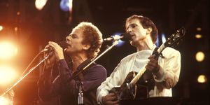 Paul Simon and Art Garfunkel perform live on stage at Wembley Stadium in London on June 19, 1982