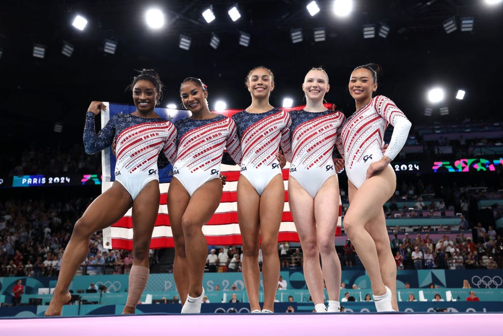 paris, france july 30 l r simone biles, jordan chiles, hezly rivera, jade carey and sunisa lee of team united states celebrate after winning the gold medals during the artistic gymnastics womens team final on day four of the olympic games paris 2024 at bercy arena on july 30, 2024 in paris, france photo by naomi bakergetty images