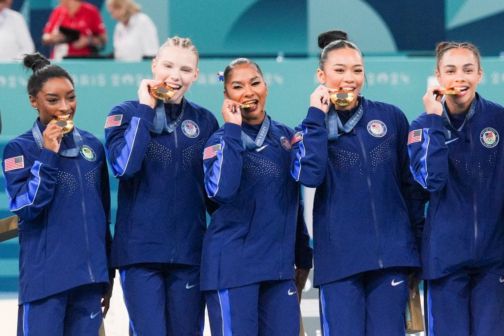 Everything Simone Biles Said On the Olympics Podium, According to a Lip