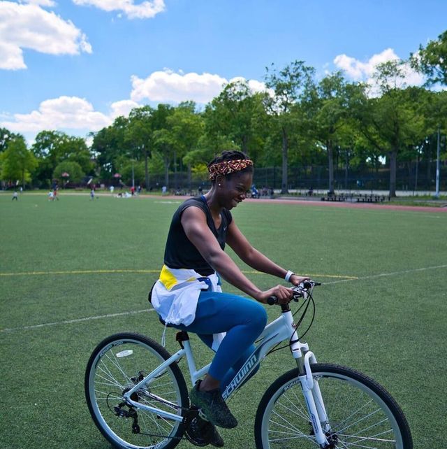 simone tchouke riding a bike