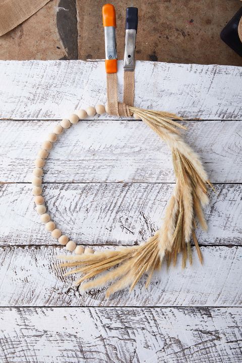 beaded wreath form with a wheat swag attached