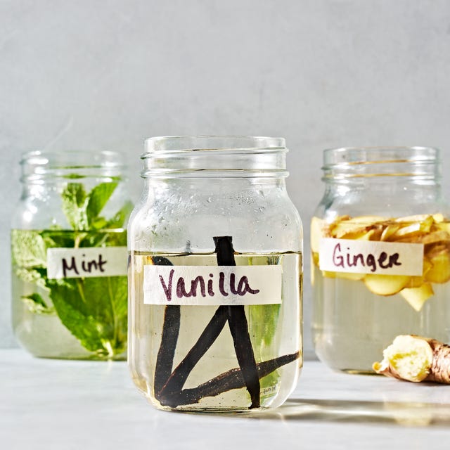 simple syrup in a jar with mint, vanilla, and ginger simple syrups