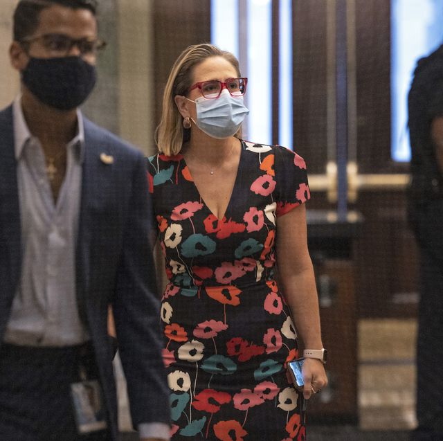 washington, dc   september 22 sen kyrsten sinema d az walks to the senate chambers at the us capitol on september 22, 2021 in washington, dc the senate is currently working towards an agreement to fund the government and increase the debt limit  photo by kevin dietschgetty images