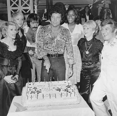portrait of debbie reynolds and other notables at tom jones' birthday party