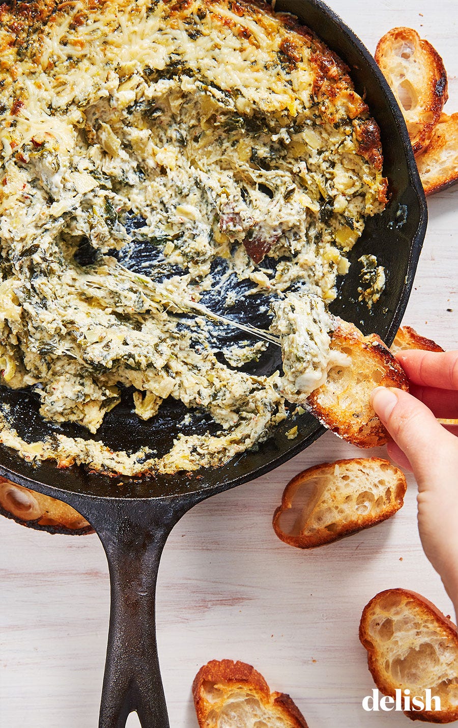 https://hips.hearstapps.com/hmg-prod/images/singleimagebug-spinach-artichoke-dip-1547855541.jpg?crop=0.881xw:0.834xh;0.0308xw,0&resize=980:*