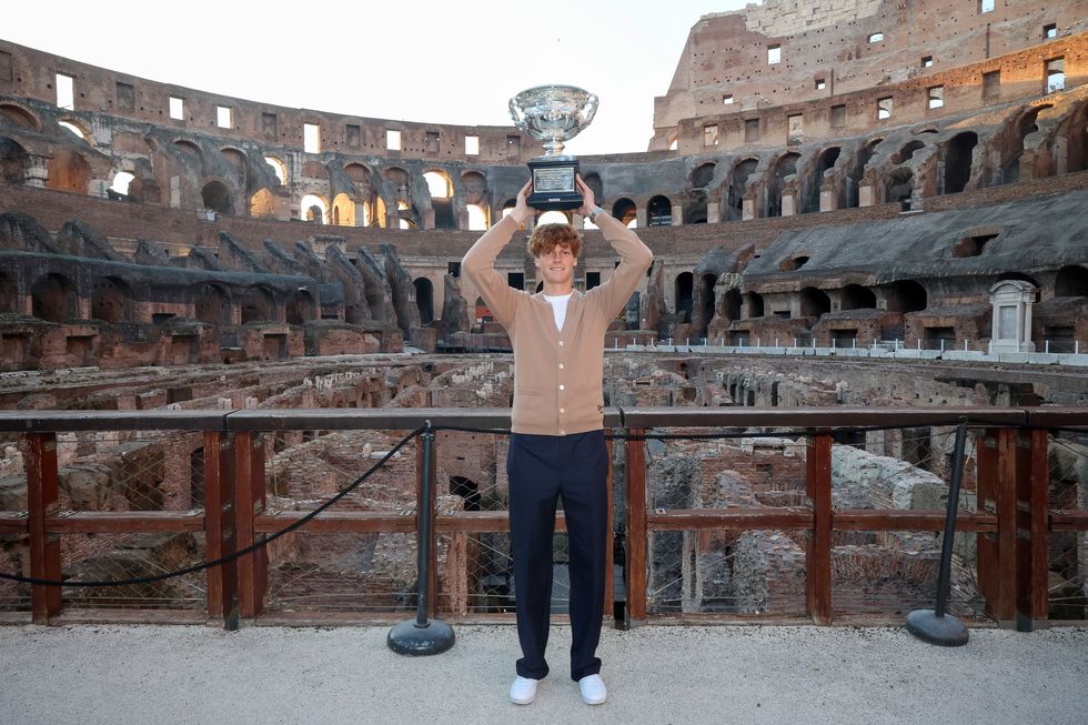 rome, italy january 31 jannik sinner of italy, winner of the 2024 australian open, poses with the norman brookes challenge cup at colosseum on january 31, 2024 in rome, italy photo by giampiero spositogetty images