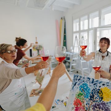 women in a sip and paint class