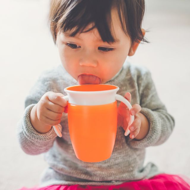 https://hips.hearstapps.com/hmg-prod/images/sippy-cup-toddler-girl-royalty-free-image-1690405898.jpg?crop=0.668xw:1.00xh;0.245xw,0&resize=640:*