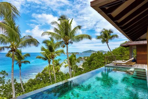 Property, Resort, Swimming pool, Caribbean, Vacation, House, Real estate, Natural landscape, Building, Tropics, 