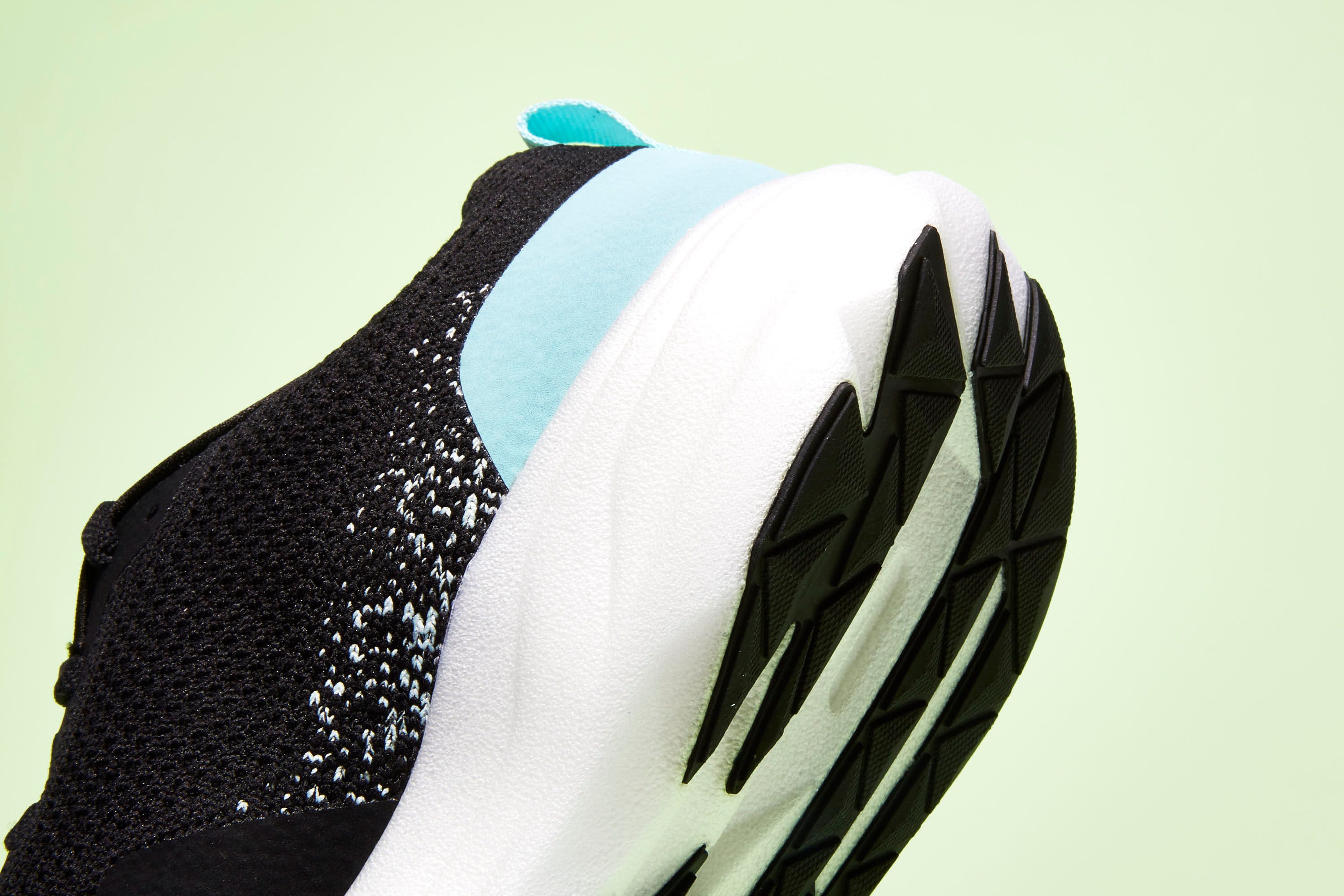 White, Black, Shoulder, Turquoise, Black-and-white, Outerwear, Sportswear, Sleeve, Textile, Feather, 