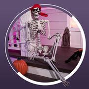 pirate skeleton sitting on front porch