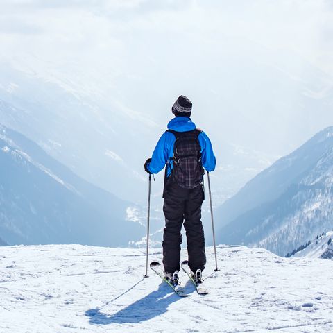 skiing background, skier in beautiful mountain landscape