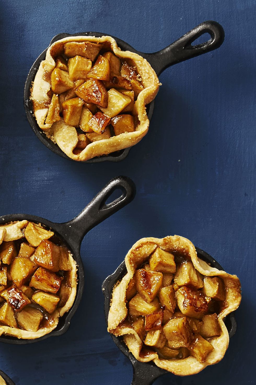 mini apple pies in cast iron skillets