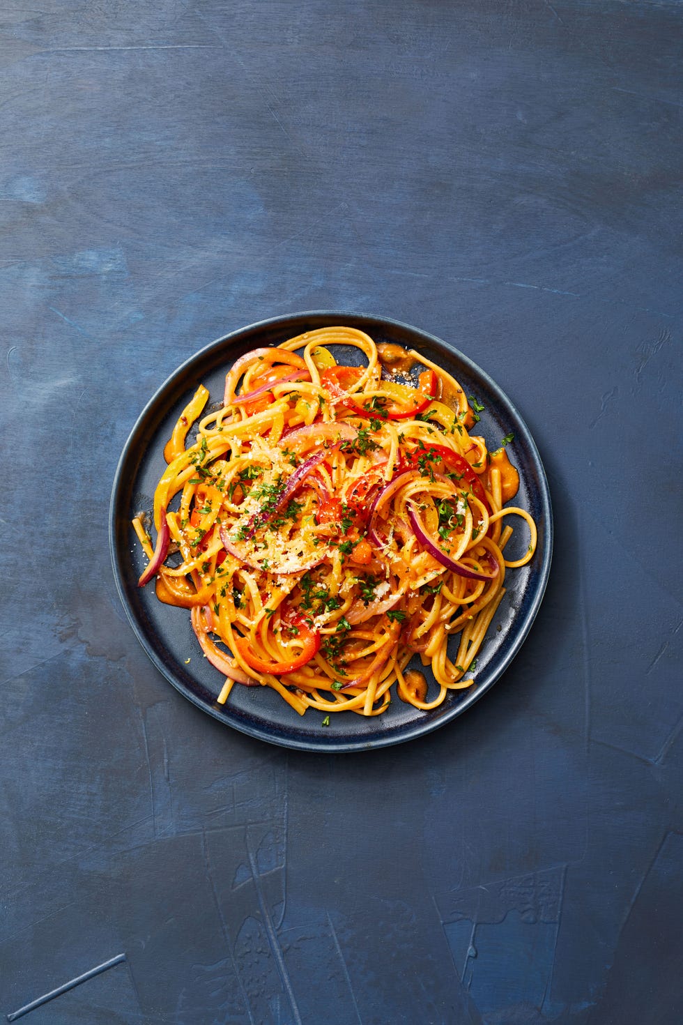 skillet pepper pasta on a blue background