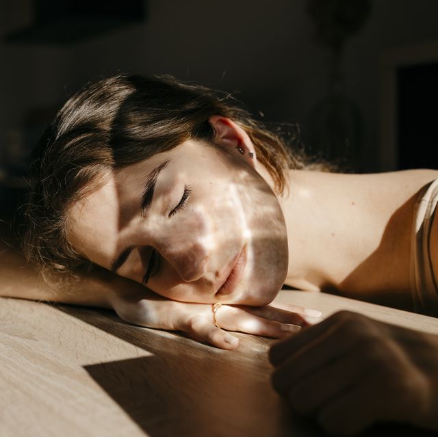 a person sleeping on a bed