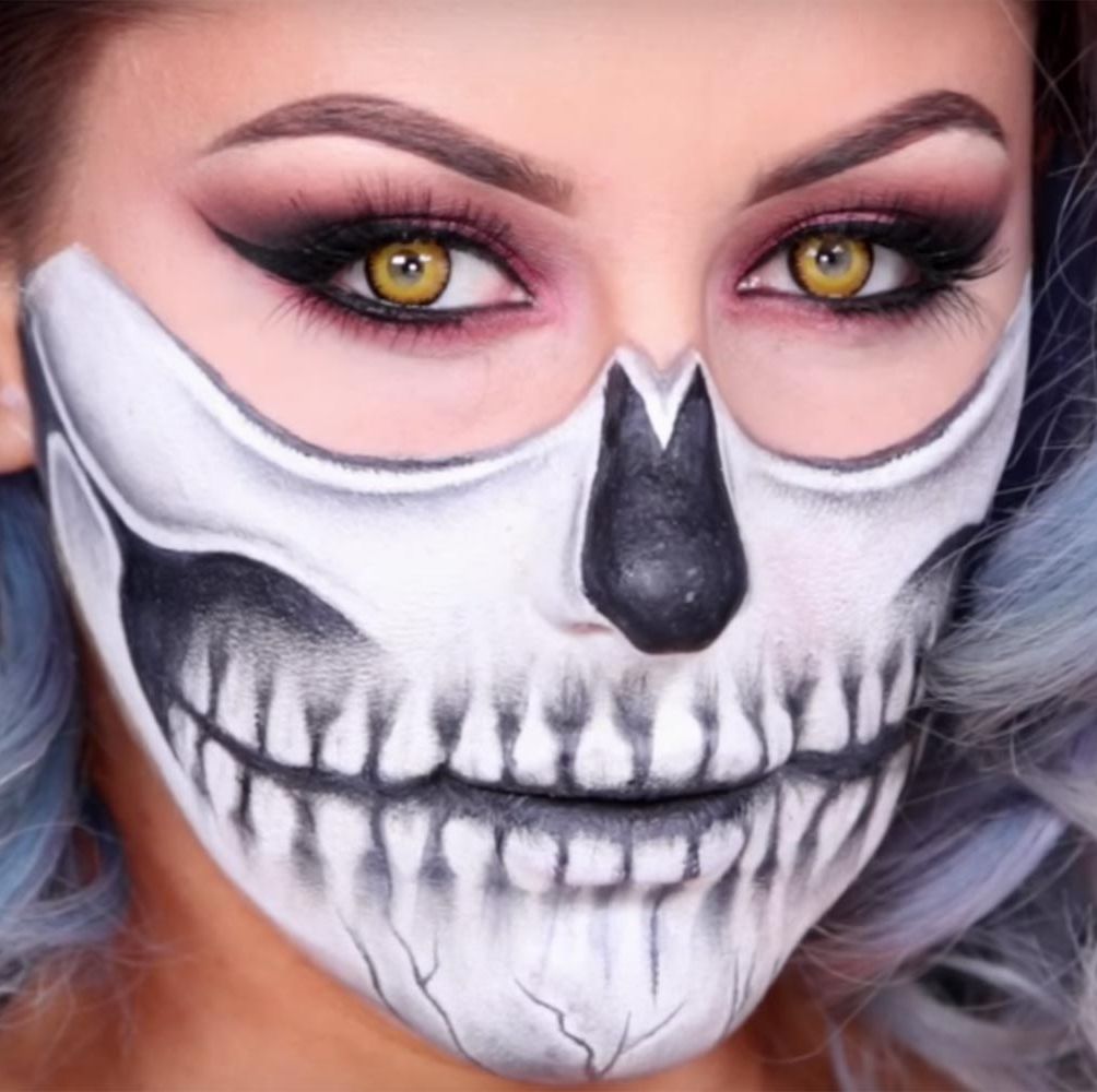 Close up of greyscale Halloween makeup done using MAC white full coverage  foundation. Black a…
