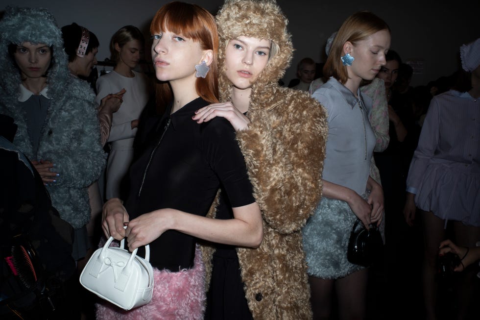 a group of women in clothing