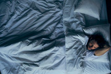 Man lying in bed