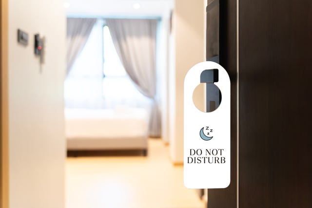 do not disturb sign on hotel door