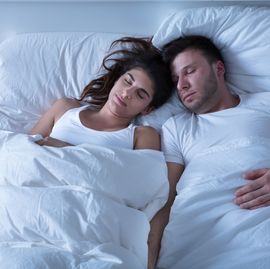 sleeping young couple