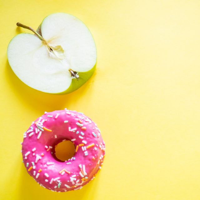 A slice of apple and a donut