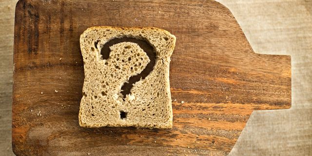 A slice of bread toast with a question mark