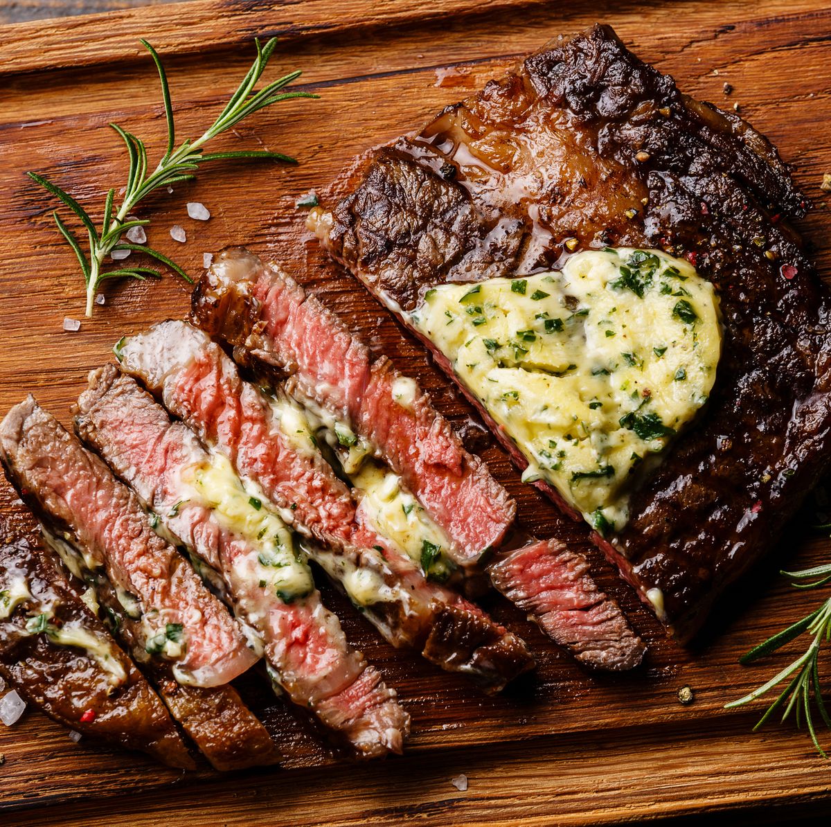 Sliced grilled steak Ribeye with herb butter