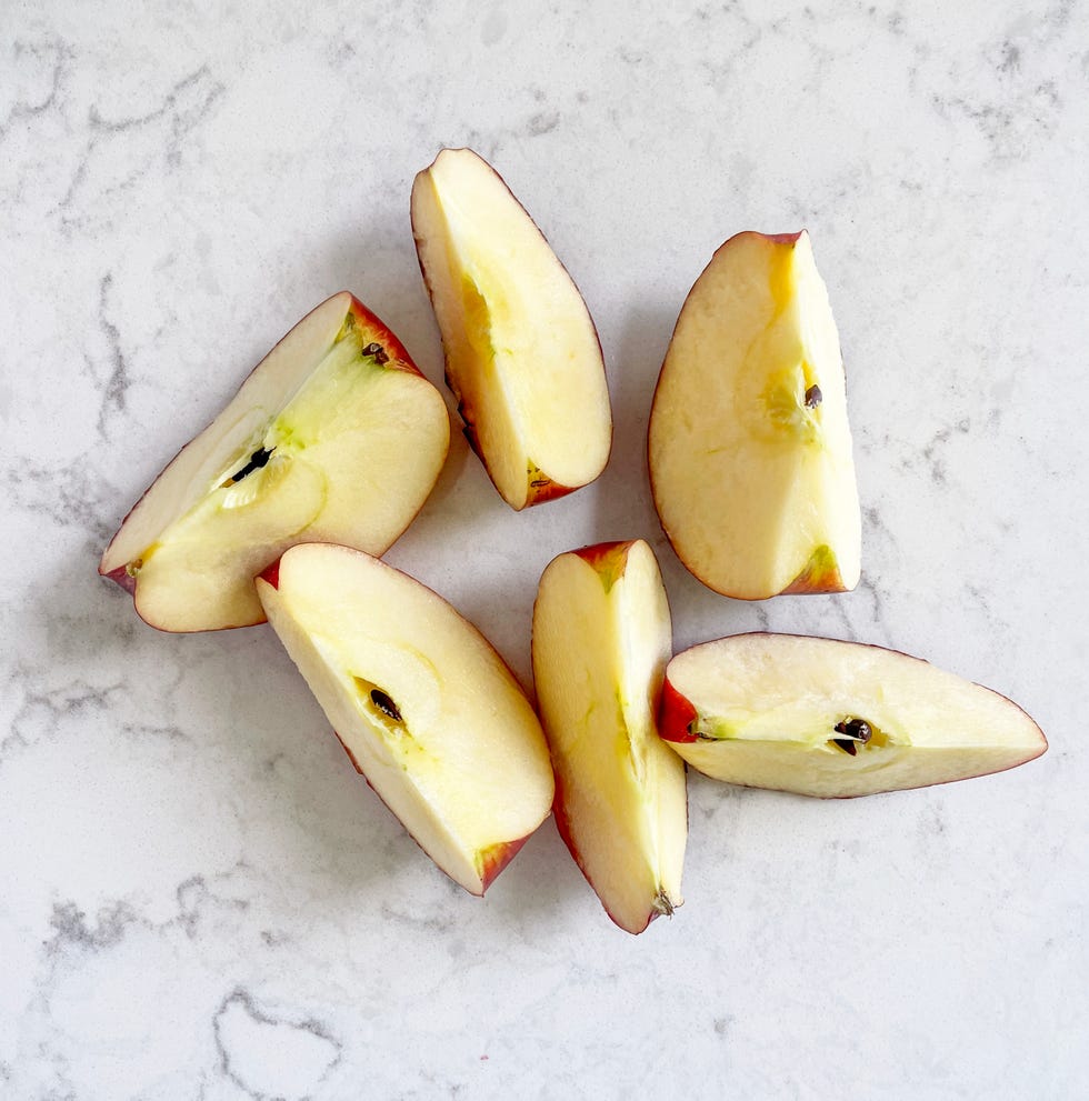 slices of apple on white background