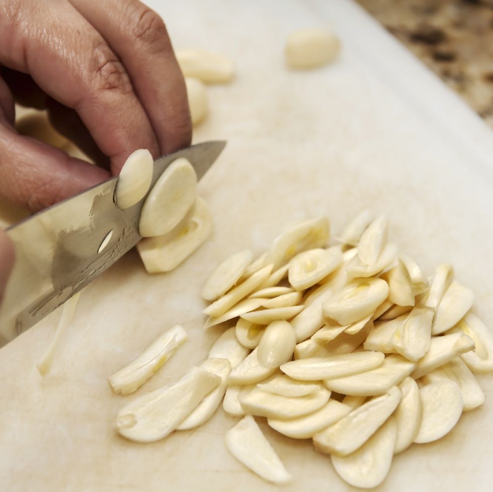 slicing garlic on close up