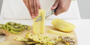slicing pineapple, close up