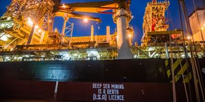 deep sea mining ship with protest message