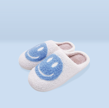 a pair of blue and white slippers