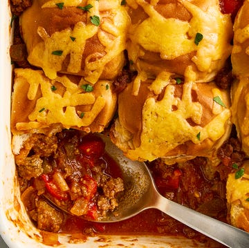 Sloppy Joe Casserole casserole dish with sloppy joe mixture topped with mini buns and melted cheese