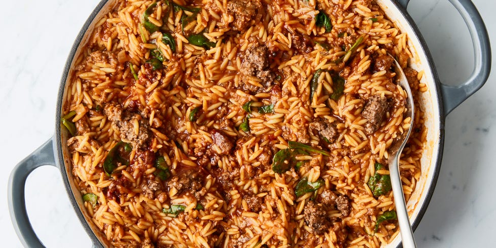 orzo in a tomato sauce with meatballs and basil