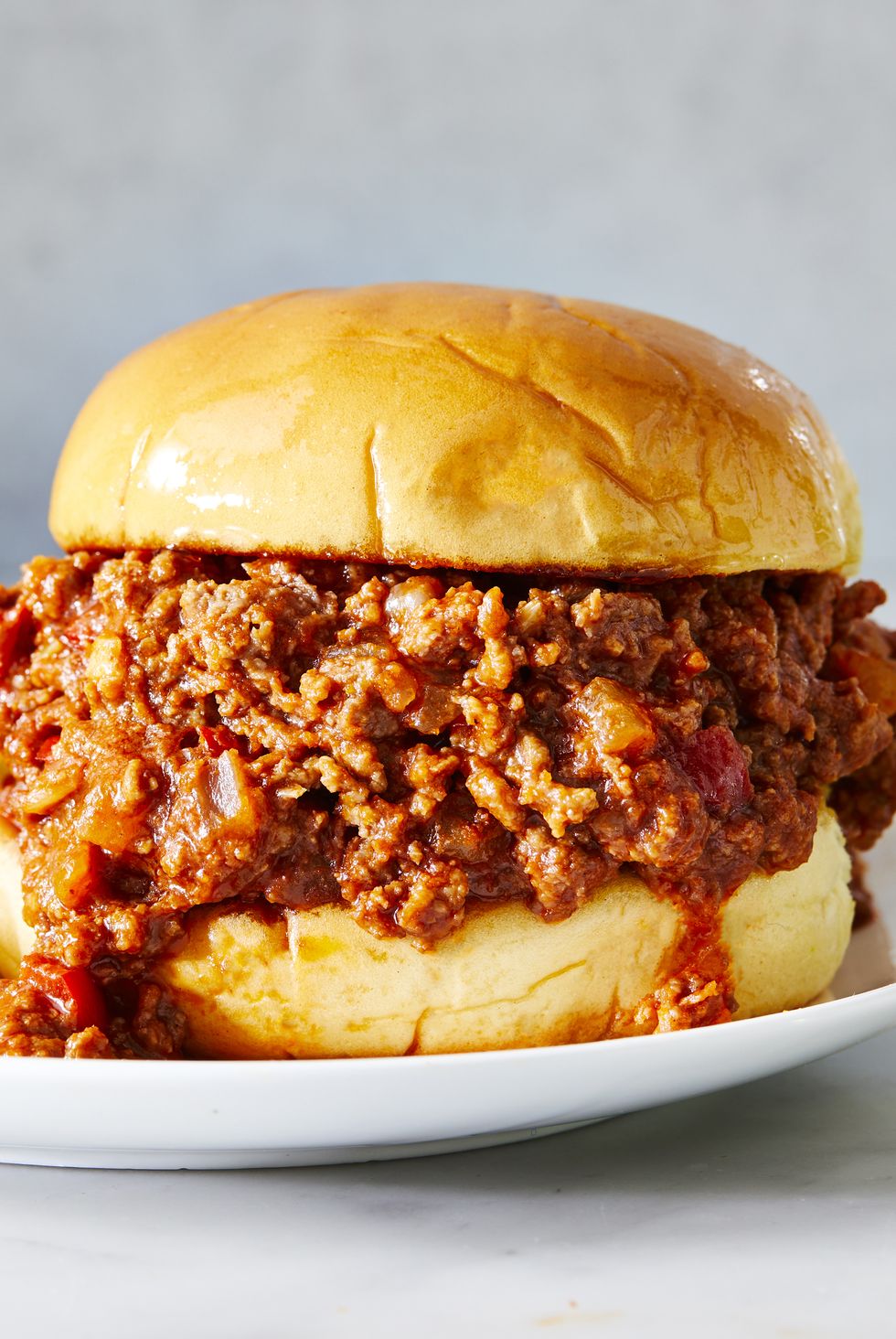 sloppy joes served on a toasted bun with chips