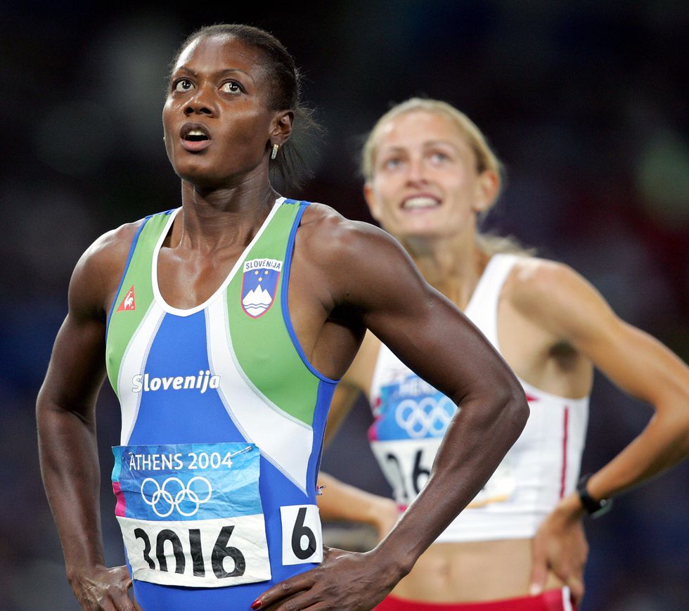 slovenia's merlene ottey (l) and poland'