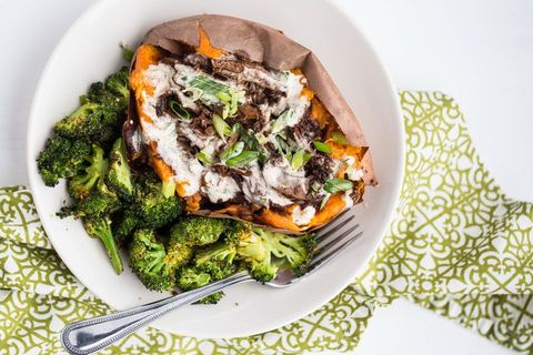 bbq ranch baked potatoes with broccoli on white plate