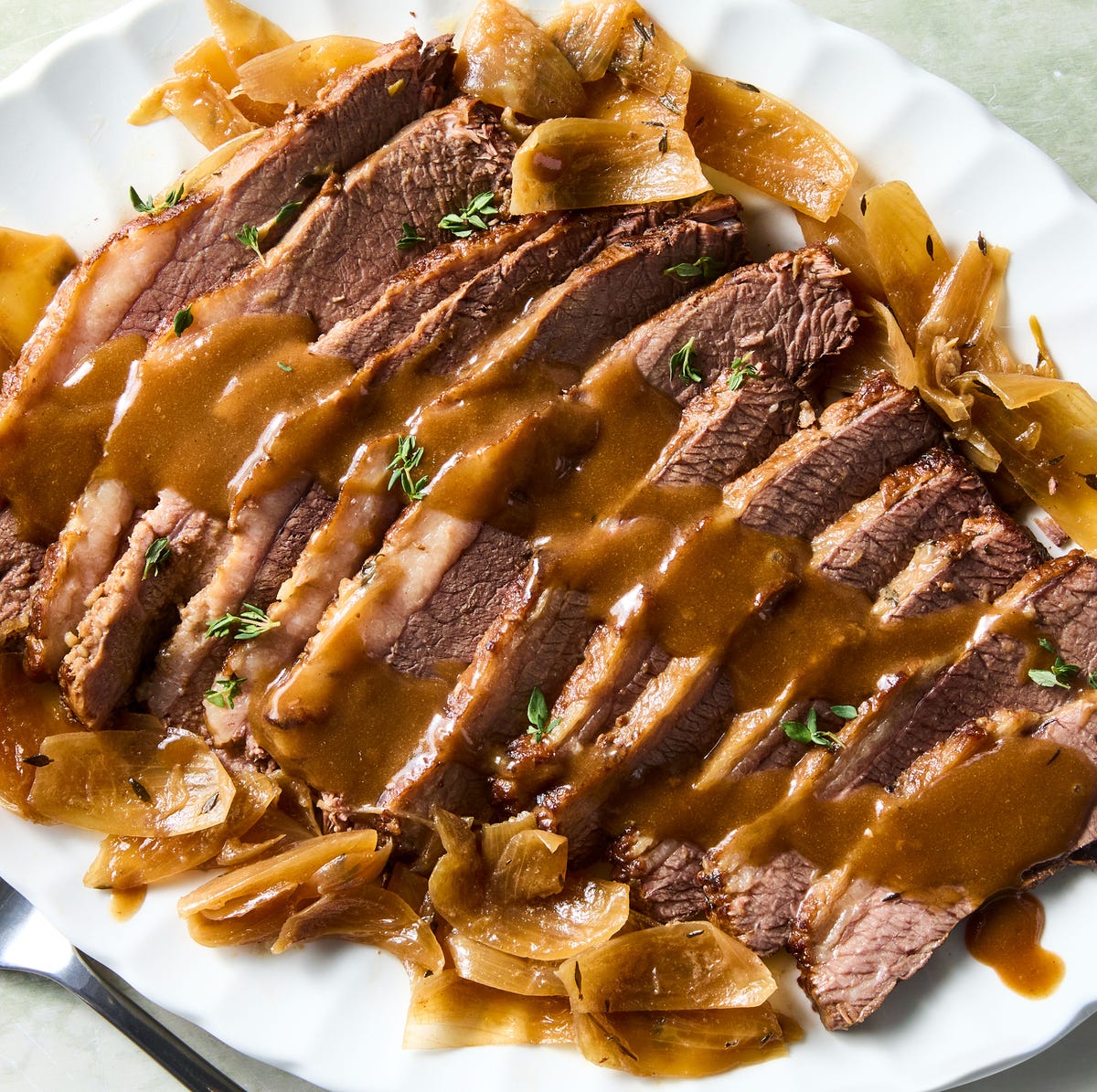 Slow-Cooker Brisket this easy slow cooker brisket is fork tender and comes with an irresistible umami packed gravy.