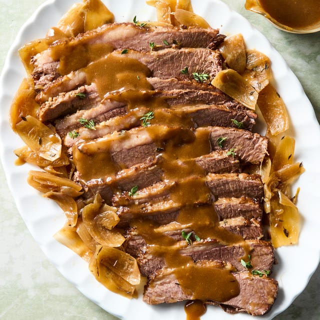 this easy slow cooker brisket is fork tender and comes with an irresistible umami packed gravy.