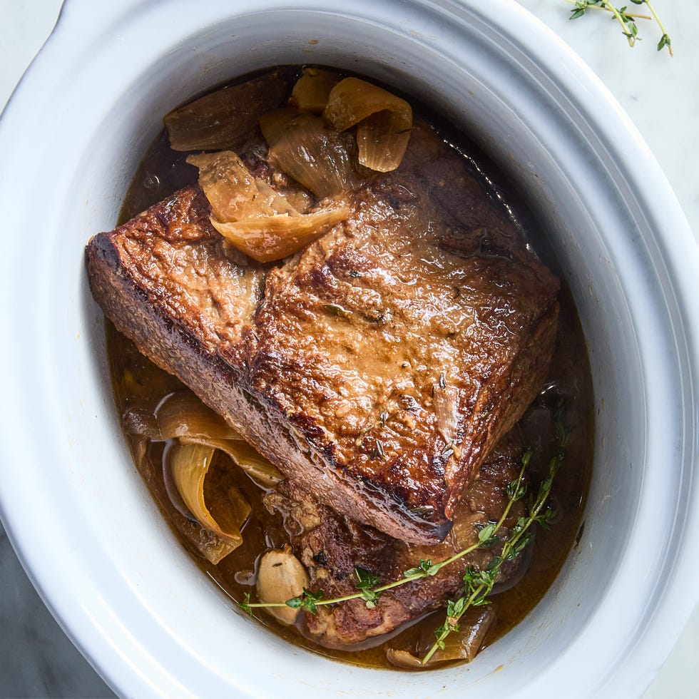 this easy slow cooker brisket is fork tender and comes with an irresistible umami packed gravy.