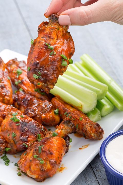 slow cooker buffalo ranch wings with scallions on top
